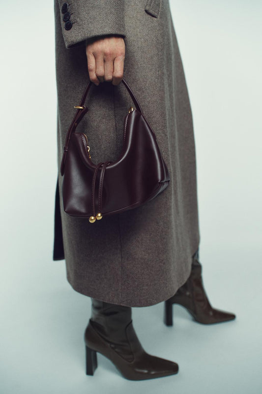 MINI SACA DE MANO DETALLE BOLAS